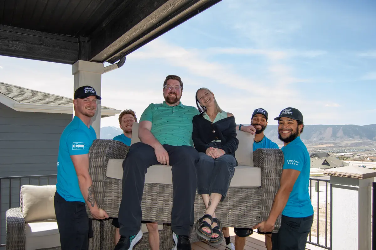 iHaul iMove movers helping clients with furniture